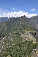 Fototapeta premium View of the lost Incan city of Machu Picchu, as seen from high up Huayna (Wayna) Picchu