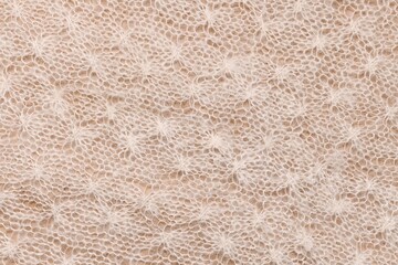  Diagonally knitted background with a braided recurring homogeneous pattern. 