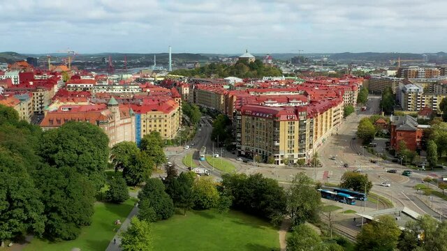 Aerial view from Slottsskogen on Gothenburg city. Blue trams and buses transportation and historical buildings. Drone view of Sweden.