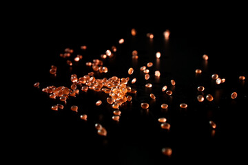 Fragrance beads on black background