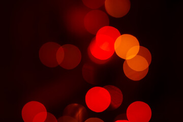 blurry Christmas lights garlands in the dark