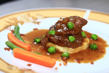 Javanese steak with mass potato and black pepper sauce