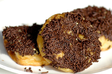 Donuts with chocolate grains sweetened the taste