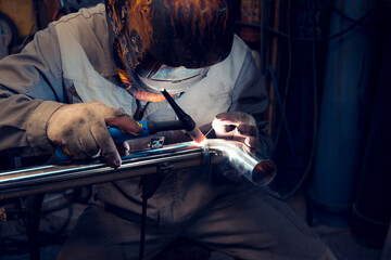 TIG welding of polished stainless steel pipe - 381256454