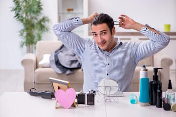 Young handsome man preparing for date