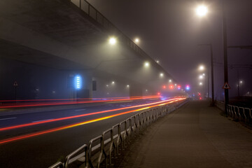 Fototapeta na wymiar Busy street with fog