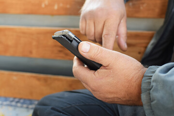 Obraz premium smartphone in a man's hand