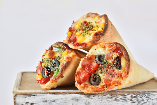 Organics And Delicious Pizza Cones With A Crunchy Thin Crust, Lots Of Melted Cheese, Fresh Vegetables And Fine Spices