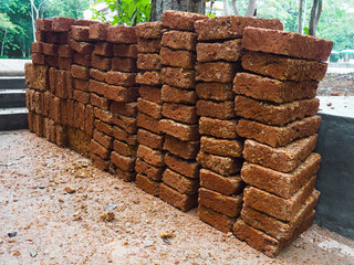 Many laterite stones were stacked in layers. To wait to decorate the landscape in the historical park