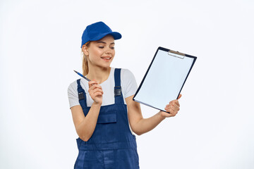 Working woman in uniform documents delivery service courier services