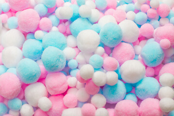 White, pink and blue soft pompons