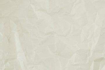 Crumpled white paper background.