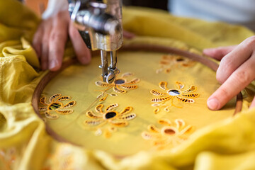 Close up shot of embroidery making and its machine