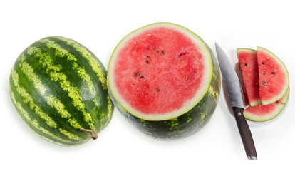 Whole striped watermelon, watermelon partly sliced and kitchen knife
