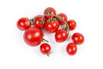 Freshly picked red cherry tomatoes on withered branch and separately