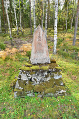 old mile stone from 1781 near road in Sweden