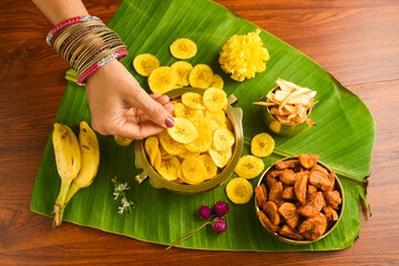 Kerala banana chips for Onam festival popular deep fried snack traditional South Indian tea time snack on banana leaf, Kerala India. fried in coconut oil on Onam, Vishu, Diwali/Deepawali, Ramzan, Eid.