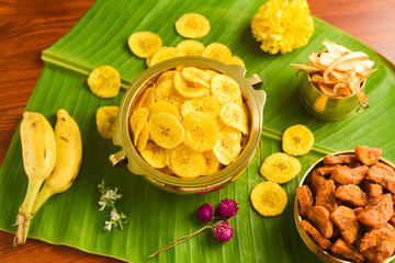 Kerala banana chips for Onam festival popular deep fried snack traditional South Indian tea time snack on banana leaf, Kerala India. fried in coconut oil on Onam, Vishu, Diwali/Deepawali, Ramzan, Eid.