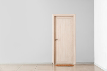 View of closed door in hall