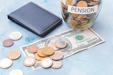 Jar with savings and wallet on color background. Concept of pension