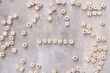 Cubes with word PENSION on grey background