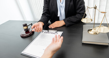 A woman lawyer or a judge counseling clients about judicial justice and prosecution with scales,...