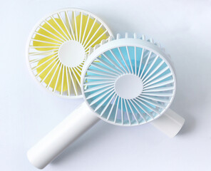 two Portable Mini Fan isolated on white background