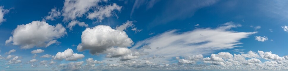 Obraz na płótnie Canvas Fantastic clouds against blue sky, panorama