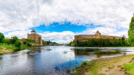 Fototapeta na wymiar Panoramic view of Narva Castle in Estonia and Ivangorod Castle in Russia