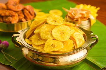 Kerala banana chips for Onam festival popular deep fried snack traditional South Indian tea time snack on banana leaf, Kerala India. fried in coconut oil on Onam, Vishu, Diwali/Deepawali, Ramzan, Eid.