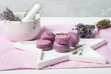 macaroons with lavender on a white table