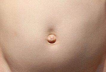 Belly button. the child's stomach. - obrazy, fototapety, plakaty