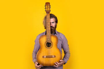 its my life. casual male guitarist. concept of music and vocal. man playing the acoustic guitar....