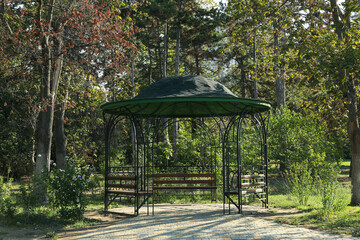 Gazebo in beautiful city park in bright sunny morning