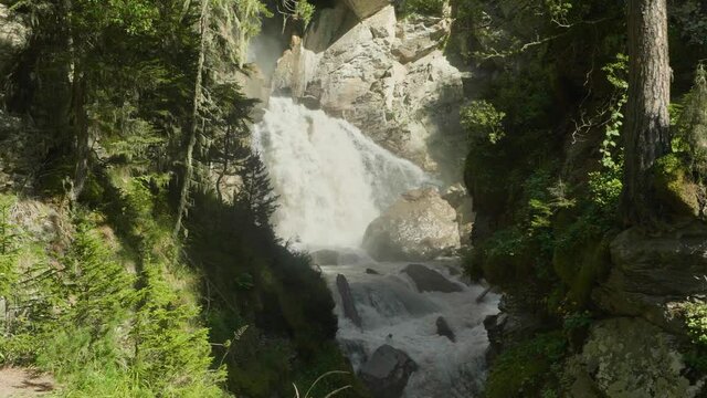 View of great waterfall in clove Mahar in Caucasus Russia. Picturesque place in mountain area.