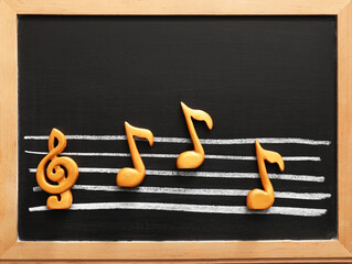 Chalkboard with music notes, top view