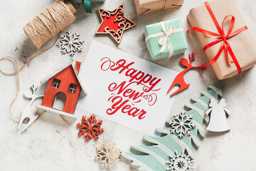 Beautiful greeting card for New Year celebration on light background