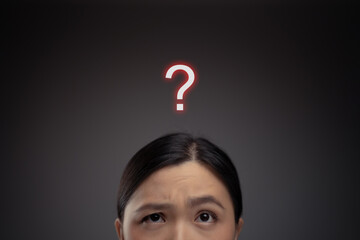Asian woman confused and question mark icon hologram effect.