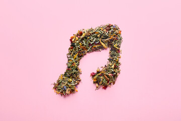 Music note made of dry tea on color background