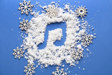 Music note drawn on snow against color background