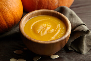 Autumn pumpkin cream soup closeup