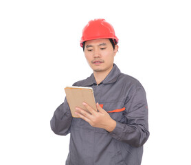 Worker wearing red hard hat holding tablet in hand