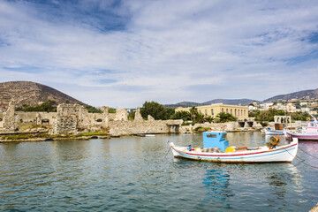Fototapeta na wymiar fishing boat docked near industrial port of Ermoupolis in Syros island, Cyclades, Greece