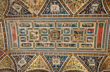 Ceiling covered with pictures of the medieval library in Siena Cathedral (Duomo di Siena) of the 13th century in Siena, Tuscany, Italy