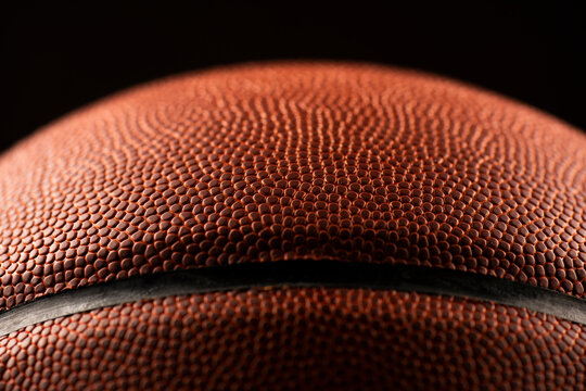 Detailed closeup macro photo of a basketball, sports background.