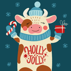 Holly Jolly. Bull in a hat with a gift and an inscription on the belly. Great lettering for greeting cards, stickers, banners, prints and home interior decor. Xmas card. Merry Christmas 2021.