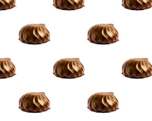 Сhocolate marshmallow, chocolate brownie on a white plate. Pattern of marshmallow in chocolate.