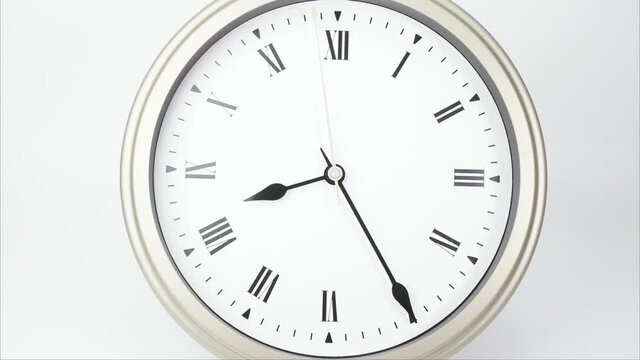 Eight o'clock classic Face With Roman Numerals, Time lapse 60 minutes.