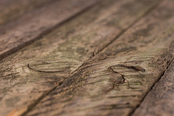 Old wooden plank background with selective focus. 