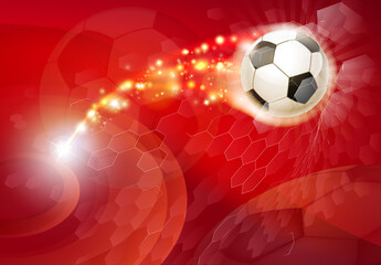 A soccer football silhouette abstract red background with ball smashing through a net © Christos Georghiou